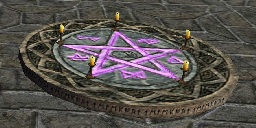 A glowing pentagram carved into stone and surrounded by candles in Ultima IX.