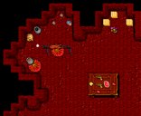 A roast on a spit above a fire in a cave. There is a dining table with plates nearby.